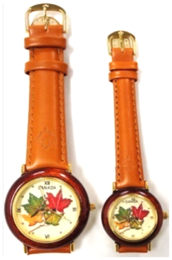 Canadian Watch with brown color belt and maple leaves in the dial